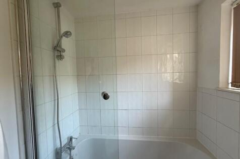 P Shaped Bath with Shower Over