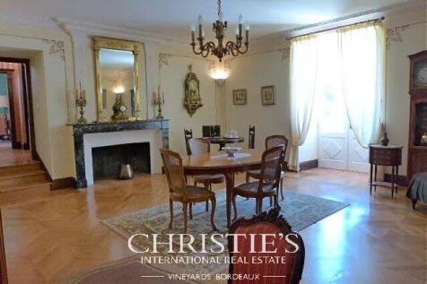 Dining room Fireplace Chandelier Tile Wooden floor