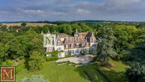 Ariel view of chateau surrounded by forest