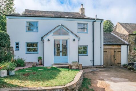 Front of House with Outbuildings