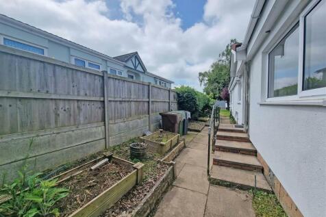 FRONT SIDE AND REAR GARDENS