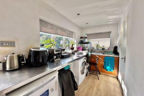 Utility Area & Shower Room