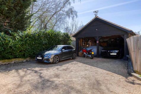 Double car barn and parking
