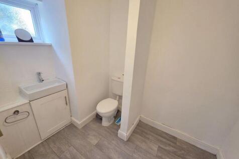 Dowstairs Cloakroom/Utility Area