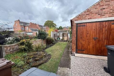 Garage and driveway not included in r