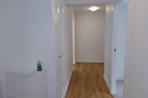 Hallway with stor...