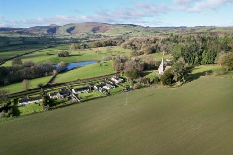 drone high rear with church.JPEG