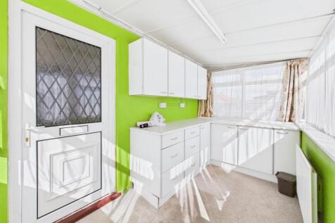 Sunroom/utility: