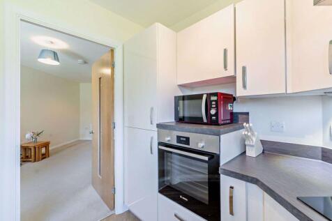Kitchen through to Living Room