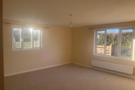 Sitting room with poles.jpg