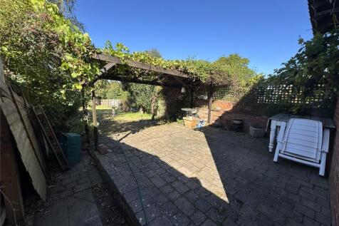 Rear Patio To Lawn