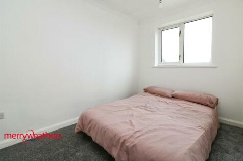 REAR BEDROOM