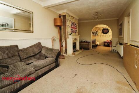 THROUGH LOUNGE/DINING ROOM