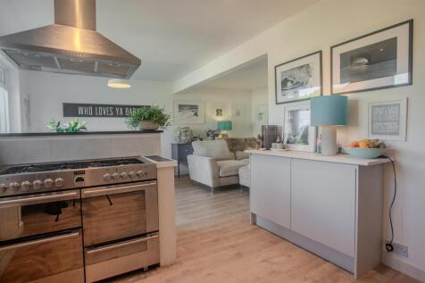 Refurbished kitchen through Lounge