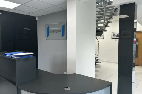 Olympic-Building-Rental-Front-Desk-scaled.png