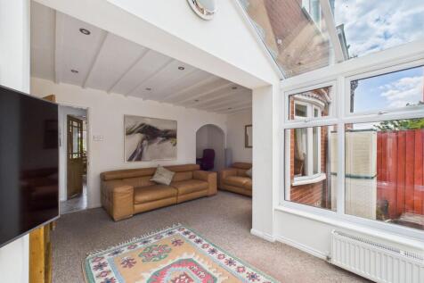 Conservatory through to Lounge