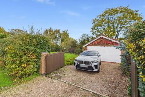 Second Driveway and Detached Double Garage