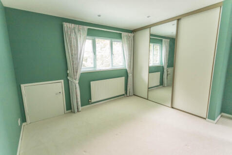 Bedroom 2 with wardrobes