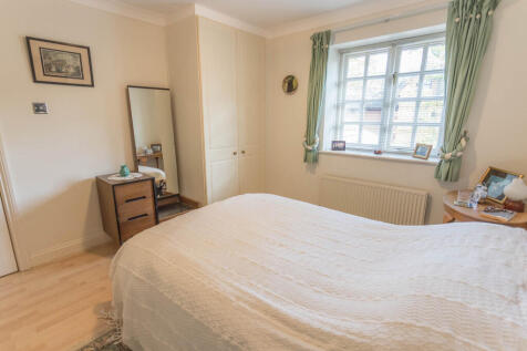 Bedroom 2 with wardrobes
