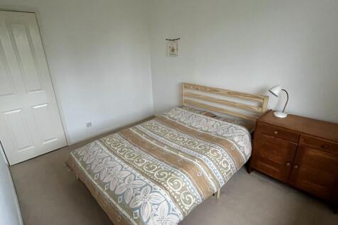 Bedroom 2 with wardrobes