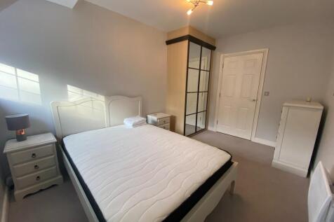 Bedroom 2 with wardrobes