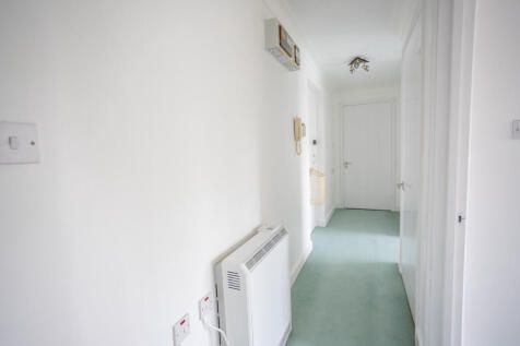 Private Entrance Hall with large storage cupboard