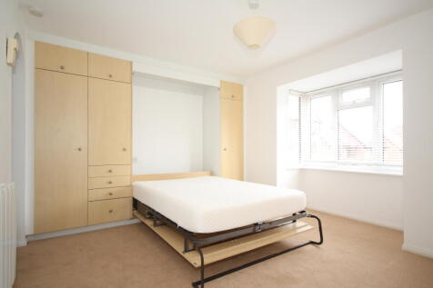 Studio room with bed down.