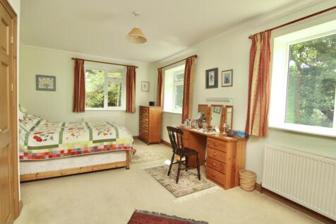 Triple Aspect Bedroom with Built in Cupboards