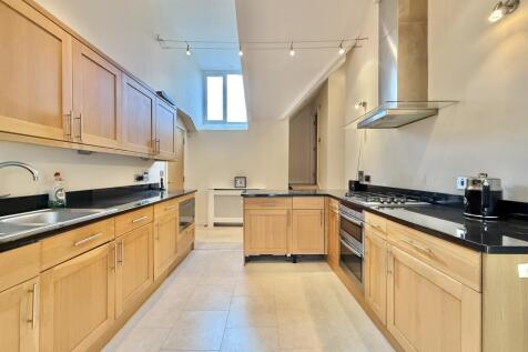 Kitchen with vaulted ceilings