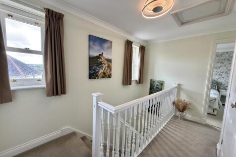 Bright Landing with Airing Cupboard