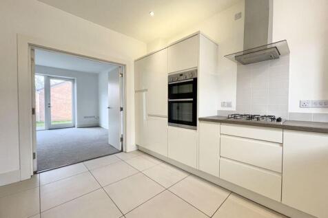 Kitchen through lounge