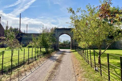 Entrance drive & archway