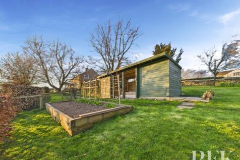 Garden sheds and veg patch