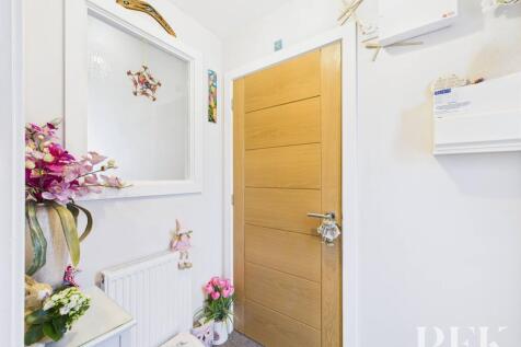 Hallway with door to WC