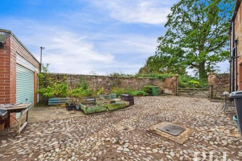 Walled Cobbled Courtyard