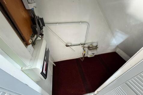 UNDERSTAIRS CUPBOARD