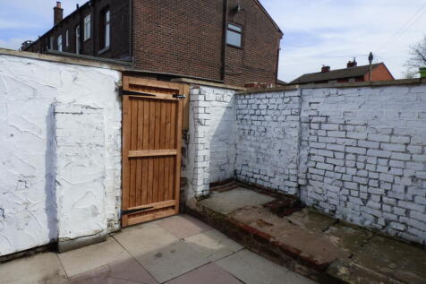 Enclosed rear yard.