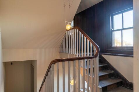 Original staircase and bannister brimming with character