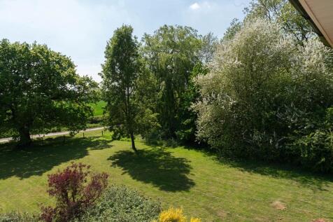 Manicured gardens with expansive countryside views