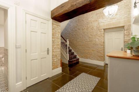 Exposed beams and stone walls