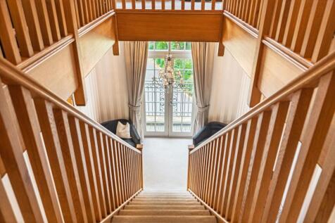 Impressive staircase forming centre of the home