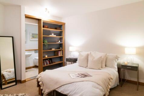 Spacious Guest Bedroom 2 with concealed ensuite