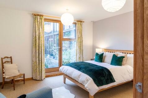 Spacious guest bedroom 3 with walk through to garden