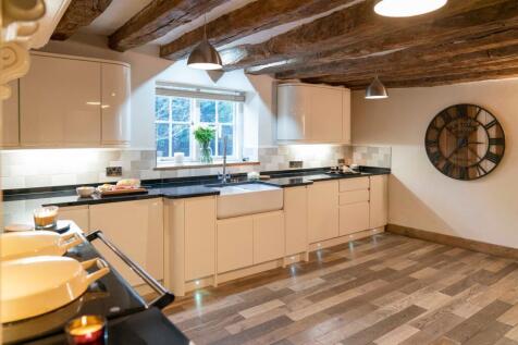 exposed beams adding character to the kitchen
