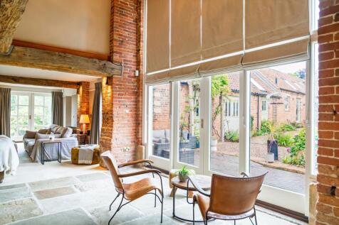 Full height windows onto the courtyard