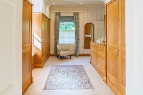 Bespoke fitted cabinetry in the master dressing room