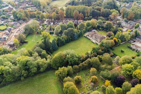Manicured lawns, Indian Stone Terraces and a protected woodland