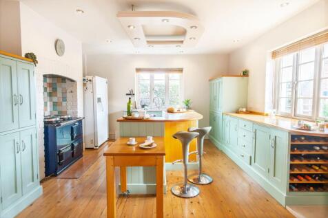 Light and brighten kitchen with bespoke cabinetry