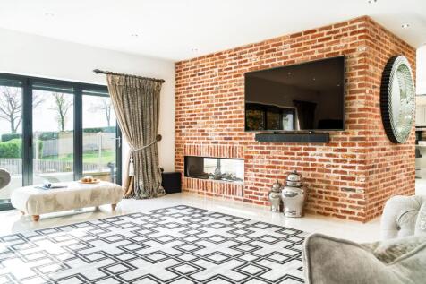 Gas fire inset in feature exposed brick wall