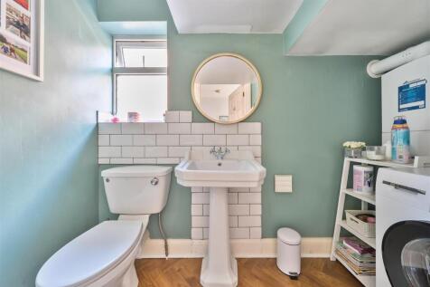 Guest Cloakroom/Utility Room: